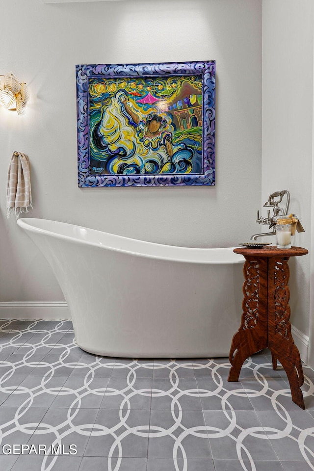 1119 Los Jardines Cir, El Paso, TX 79912 - full bathroom with a soaking tub and baseboards