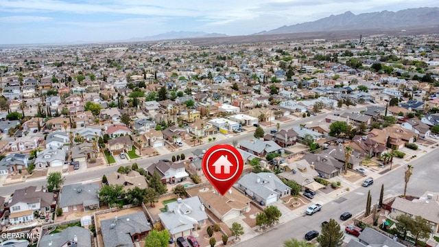 7145 Golden Hawk Dr, El Paso, TX 79912 - aerial view of property and surrounding area with mountains and nearby suburban area