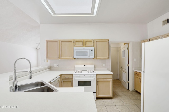 7145 Golden Hawk Dr, El Paso, TX 79912 - kitchen with white appliances, a sink, and light brown cabinetry