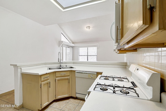 7145 Golden Hawk Dr, El Paso, TX 79912 - kitchen featuring white appliances, a sink, light tile patterned floors, light countertops, and decorative backsplash