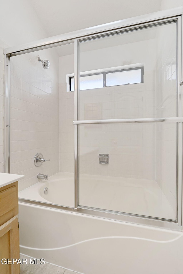 7145 Golden Hawk Dr, El Paso, TX 79912 - full bathroom with vanity, bath / shower combo with glass door, and plenty of natural light