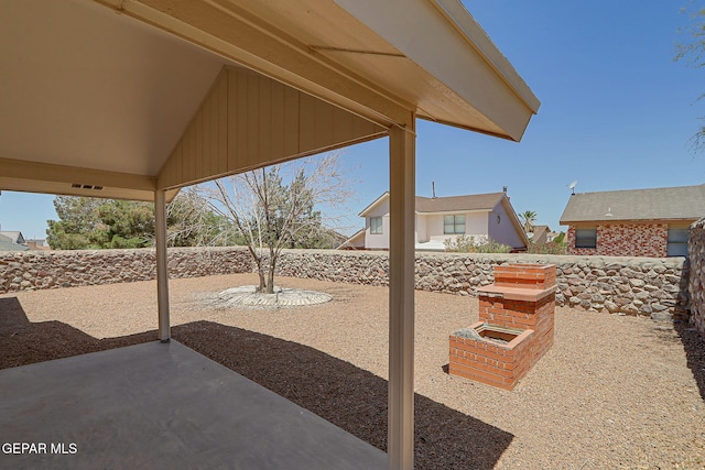7145 Golden Hawk Dr, El Paso, TX 79912 - fenced backyard with a patio
