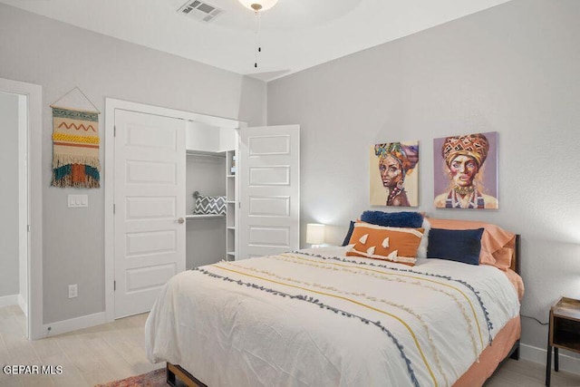 2212 Mike Price Dr, El Paso, TX 79938 - bedroom with wood finished floors and a closet