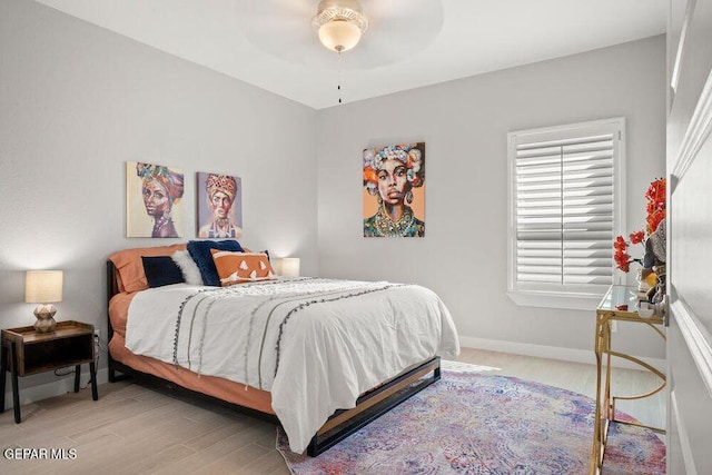 2212 Mike Price Dr, El Paso, TX 79938 - bedroom featuring light wood finished floors and a ceiling fan