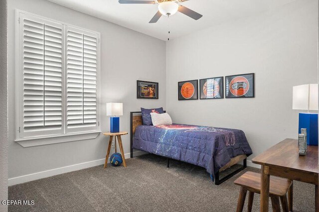 2228 Mike Price Dr, El Paso, TX 79938 - carpeted bedroom with baseboards and a ceiling fan