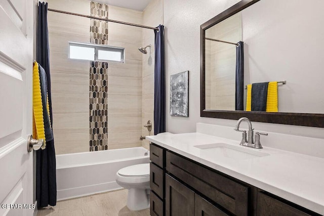 2228 Mike Price Dr, El Paso, TX 79938 - full bath with vanity, shower / bath combo with shower curtain, and wood finished floors