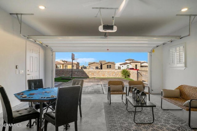 2228 Mike Price Dr, El Paso, TX 79938 - garage featuring a garage door opener and recessed lighting