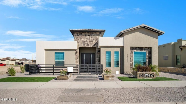 2228 Mike Price Dr, El Paso, TX 79938 - view of front facade with stucco siding and stone siding