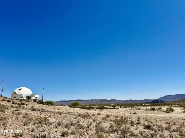 16899 Old Butterfield Trl, El Paso, TX 79938 - view of mountain backdrop with rural landscape