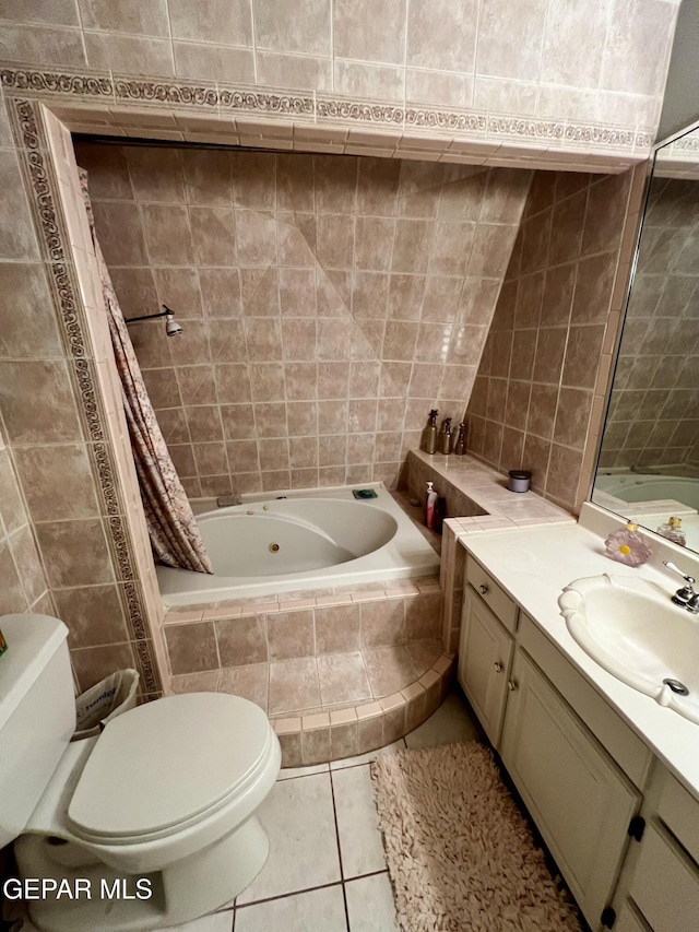 16899 Old Butterfield Trl, El Paso, TX 79938 - bathroom with tile walls, vanity, tile patterned floors, and tiled shower / bath