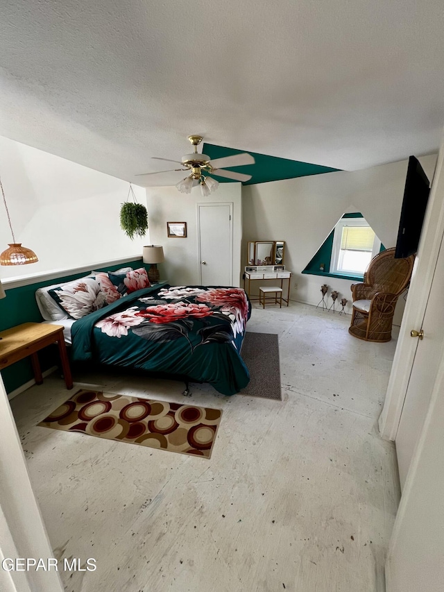 16899 Old Butterfield Trl, El Paso, TX 79938 - bedroom with a ceiling fan and a textured ceiling
