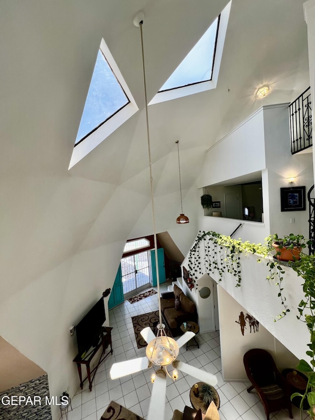 16899 Old Butterfield Trl, El Paso, TX 79938 - tiled living area with a skylight and high vaulted ceiling