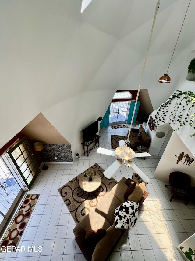 16899 Old Butterfield Trl, El Paso, TX 79938 - tiled living room with lofted ceiling