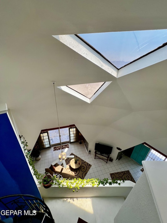 16899 Old Butterfield Trl, El Paso, TX 79938 - tiled living area featuring a skylight
