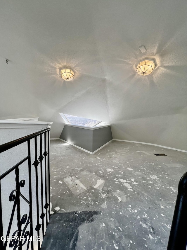 16899 Old Butterfield Trl, El Paso, TX 79938 - additional living space with a skylight and lofted ceiling