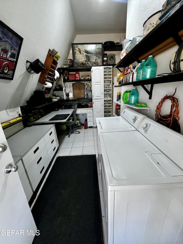 16899 Old Butterfield Trl, El Paso, TX 79938 - laundry room featuring washing machine and dryer, a textured wall, and tile patterned floors