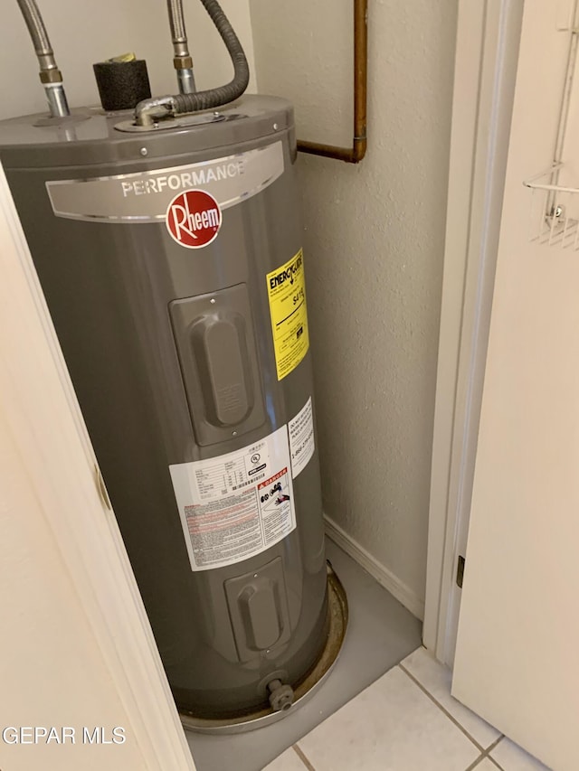 16899 Old Butterfield Trl, El Paso, TX 79938 - utility room featuring electric water heater