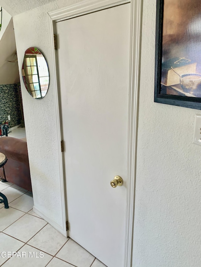 16899 Old Butterfield Trl, El Paso, TX 79938 - bathroom with a textured wall and tile patterned floors