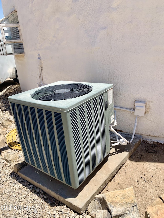 16899 Old Butterfield Trl, El Paso, TX 79938 - exterior view of a central AC unit and stucco siding