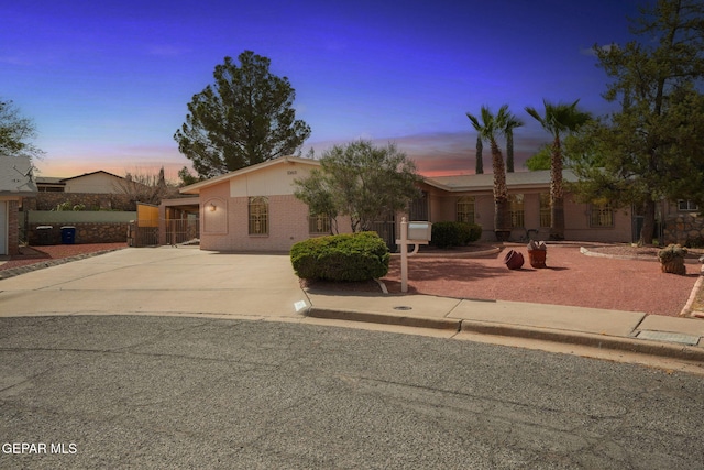 10601 Groverock Ct, El Paso, TX 79935 - view of front of property with brick siding and concrete driveway