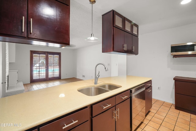 10601 Groverock Ct, El Paso, TX 79935 - kitchen featuring a sink, appliances with stainless steel finishes, french doors, light countertops, and light tile patterned floors