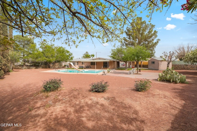 10601 Groverock Ct, El Paso, TX 79935 - view of yard with a patio area