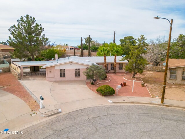 10601 Groverock Ct, El Paso, TX 79935 - view of front of home featuring driveway