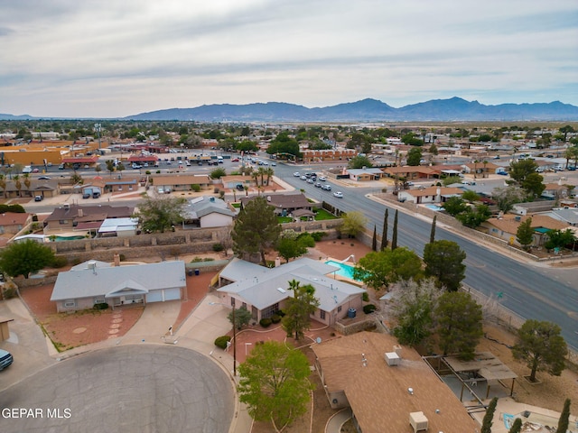 10601 Groverock Ct, El Paso, TX 79935 - aerial perspective of suburban area with a mountainous background