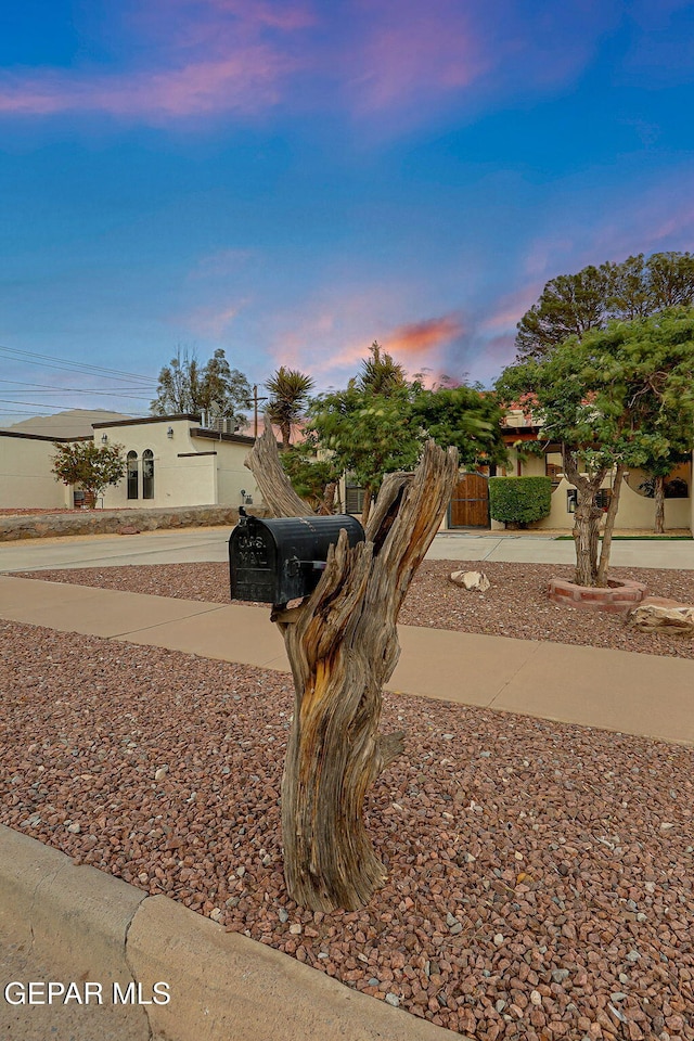 840 Tepic Dr, El Paso, TX 79912 - view of front of home with stucco siding and curved driveway