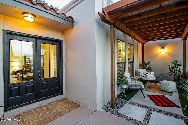 840 Tepic Dr, El Paso, TX 79912 - property entrance featuring stucco siding and french doors