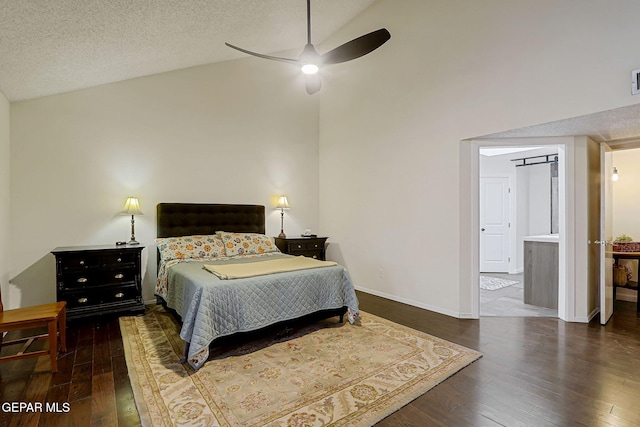 840 Tepic Dr, El Paso, TX 79912 - bedroom featuring hardwood / wood-style floors, high vaulted ceiling, baseboards, and a textured ceiling