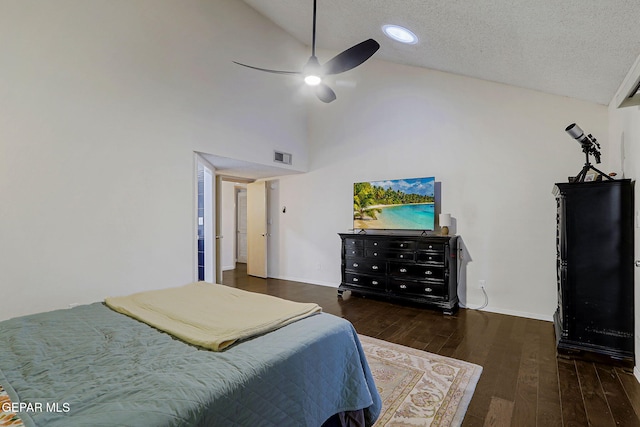 840 Tepic Dr, El Paso, TX 79912 - bedroom with wood finished floors, baseboards, high vaulted ceiling, a ceiling fan, and a textured ceiling