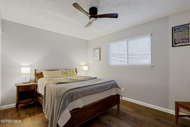 840 Tepic Dr, El Paso, TX 79912 - bedroom featuring wood finished floors, a textured ceiling, baseboards, and a ceiling fan