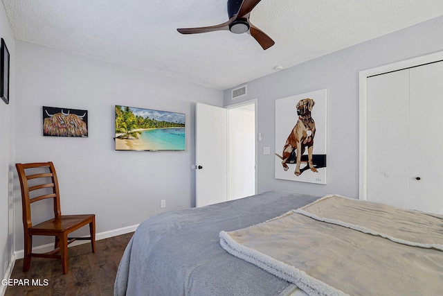 840 Tepic Dr, El Paso, TX 79912 - bedroom featuring wood finished floors, baseboards, a closet, and ceiling fan