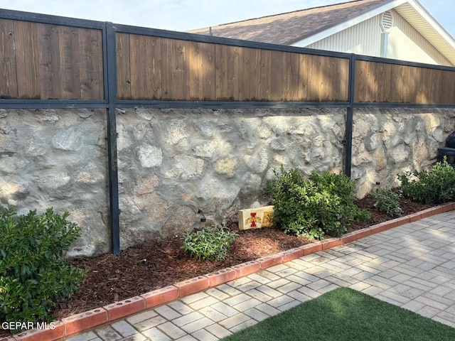 840 Tepic Dr, El Paso, TX 79912 - view of side of home with a shingled roof