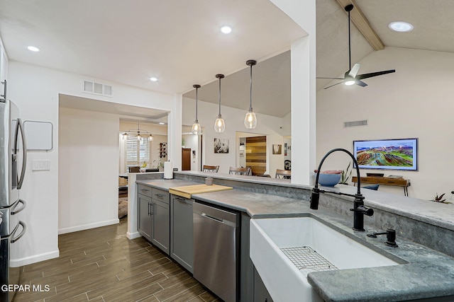 840 Tepic Dr, El Paso, TX 79912 - kitchen featuring a sink, stainless steel appliances, dark wood finished floors, ceiling fan, and baseboards