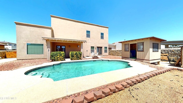 5712 Valley Lilac Ln, El Paso, TX 79932 - outdoor pool with a patio and an outbuilding