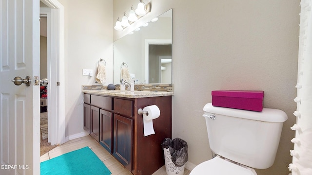 5712 Valley Lilac Ln, El Paso, TX 79932 - bathroom featuring vanity, toilet, and wood finished floors