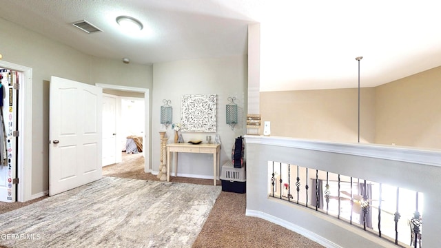 5712 Valley Lilac Ln, El Paso, TX 79932 - hallway featuring carpet flooring and baseboards