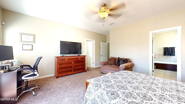 5712 Valley Lilac Ln, El Paso, TX 79932 - bedroom featuring carpet floors, an office area, ensuite bathroom, baseboards, and ceiling fan