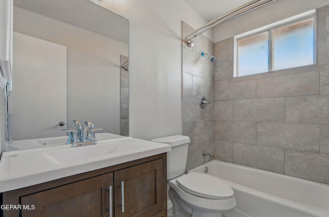 1718 Dean Jones Dr, El Paso, TX 79936 - full bath featuring toilet, vanity, and  shower combination