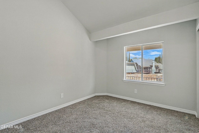 1718 Dean Jones Dr, El Paso, TX 79936 - spare room with carpet flooring, lofted ceiling, and baseboards