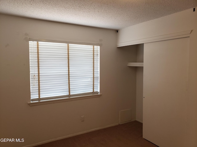 10173 Lakeview Dr, El Paso, TX 79924 - carpeted spare room featuring a textured ceiling