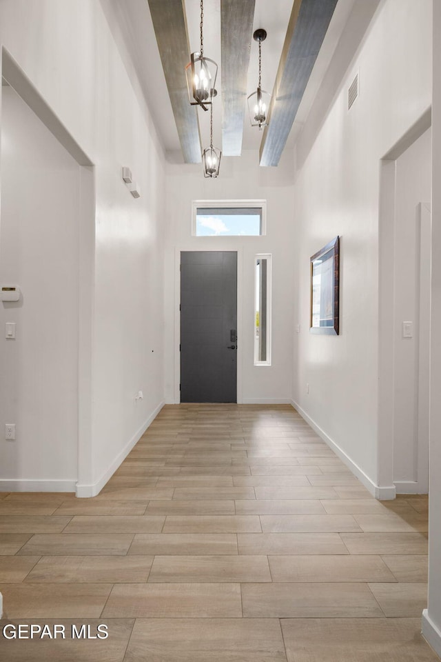 7467 Cimarron Gap Dr, El Paso, TX 79911 - entrance foyer with light wood-type flooring and baseboards