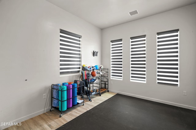 7467 Cimarron Gap Dr, El Paso, TX 79911 - misc room with baseboards and wood finished floors