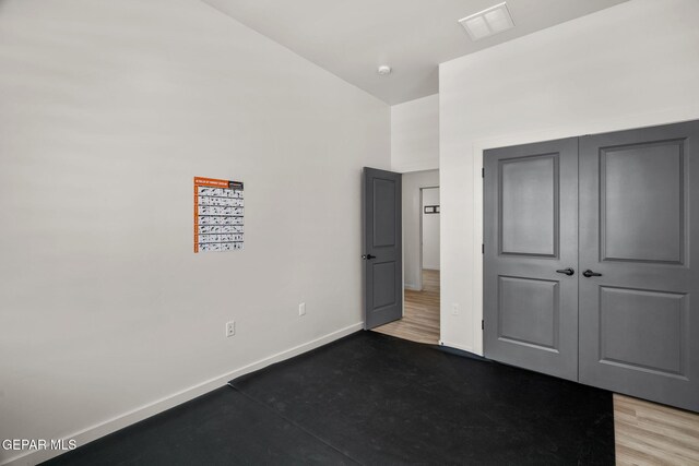 7467 Cimarron Gap Dr, El Paso, TX 79911 - unfurnished bedroom featuring baseboards and a closet