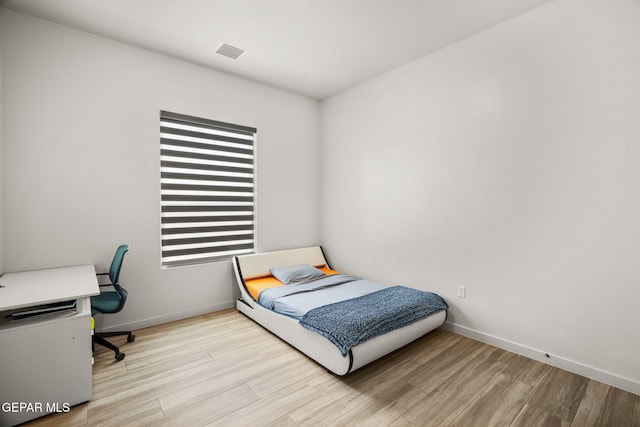 7467 Cimarron Gap Dr, El Paso, TX 79911 - bedroom with wood finished floors and baseboards