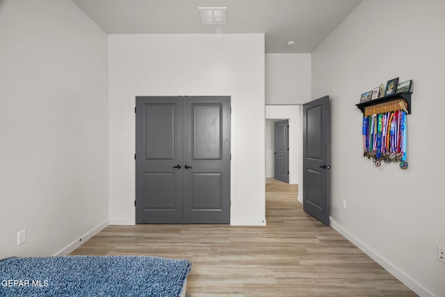 7467 Cimarron Gap Dr, El Paso, TX 79911 - bedroom with light wood-type flooring and baseboards