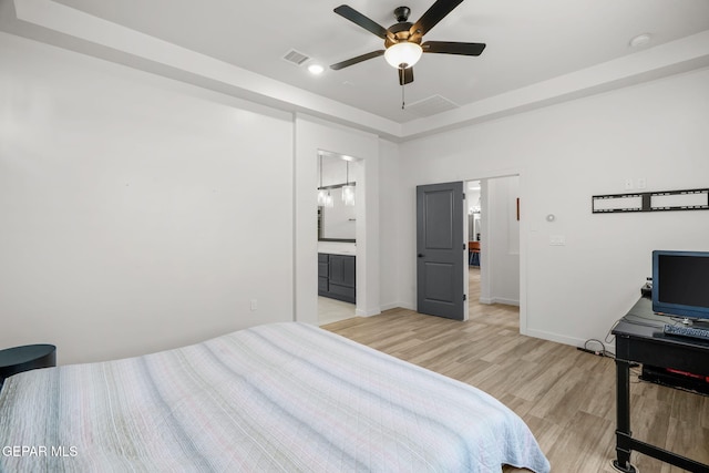 7467 Cimarron Gap Dr, El Paso, TX 79911 - bedroom featuring light wood-style flooring, baseboards, a ceiling fan, and ensuite bath