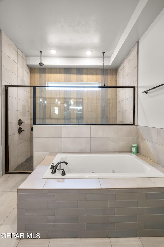 7467 Cimarron Gap Dr, El Paso, TX 79911 - bathroom featuring a tub with jets, tile patterned flooring, and a tile shower